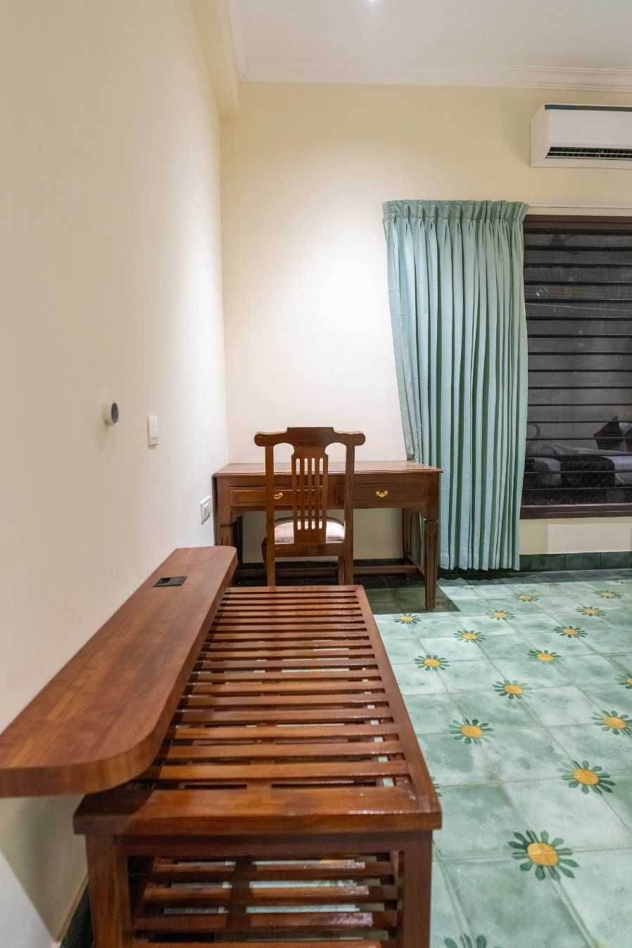 Seating area inside luxury suite at Nadhima Villas