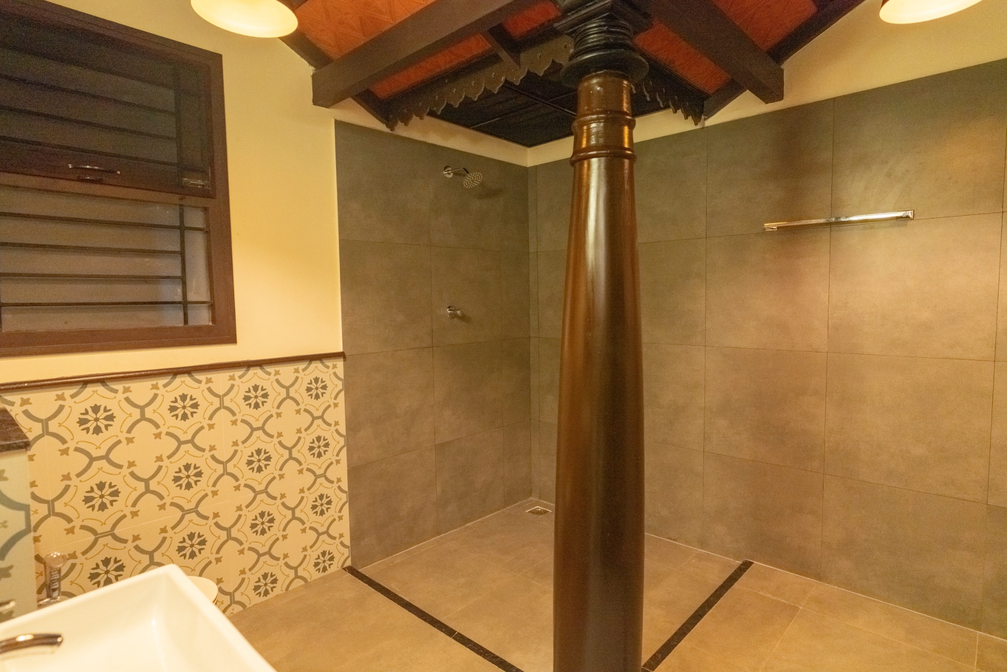 Spacious shower area in luxury villa bathroom