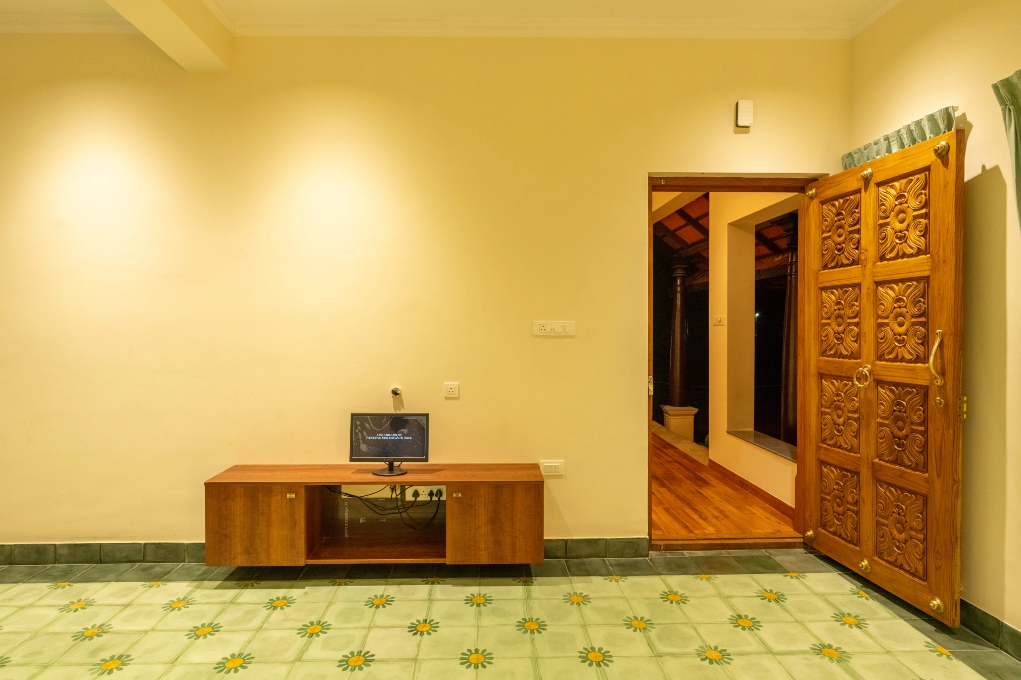 Traditional wooden entrance door in heritage villa